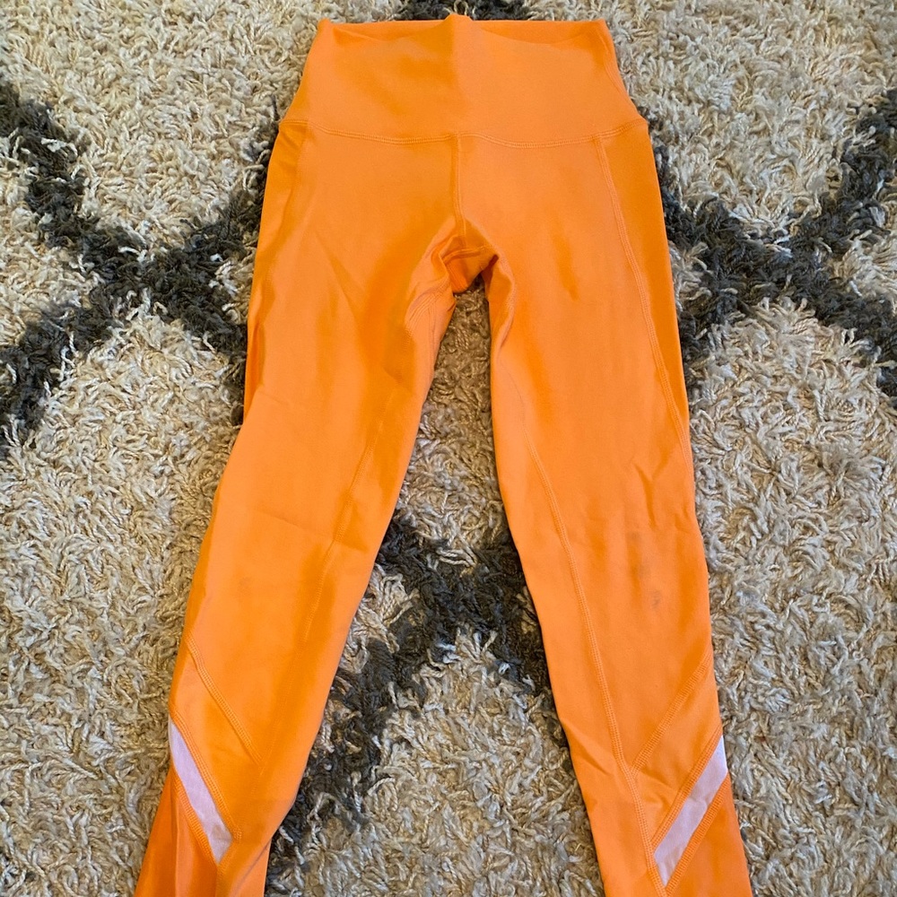 ALO YOGA leggings (orange, size XS)
